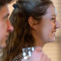 Side profile of two guests at event